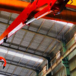Stationary Mounted Crane vs Loader Tractor cost efficiency and suitability ?